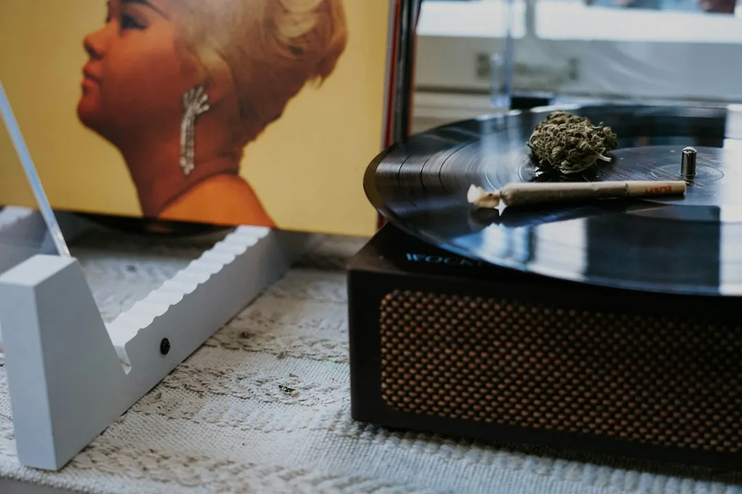 cannabis bud and joint on record player
